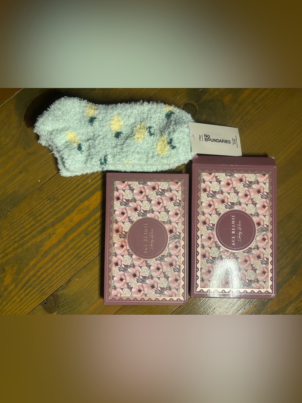 No Boundaries Plush Lemon 🍋 Patterned Socks & Ace Beauté eyeshadow pallet.